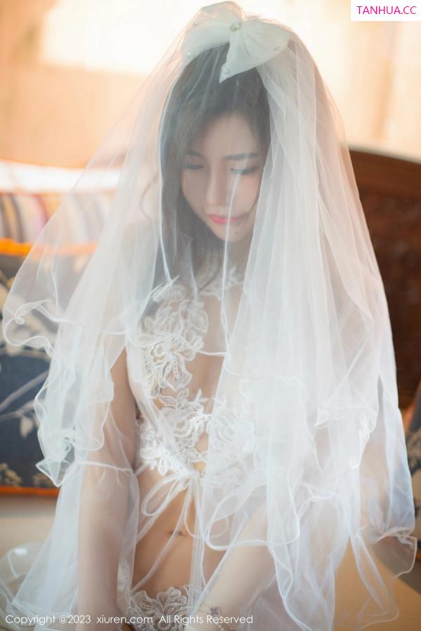 綺裡嘉 绮里嘉 [XiuRen]高清写真图 2023.09.28 No.7456 绮里嘉ula 婚纱美腿第2张图片